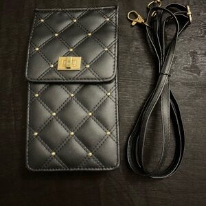 BRAND NEW without tags never worn. Black crossbody cell phone bag.